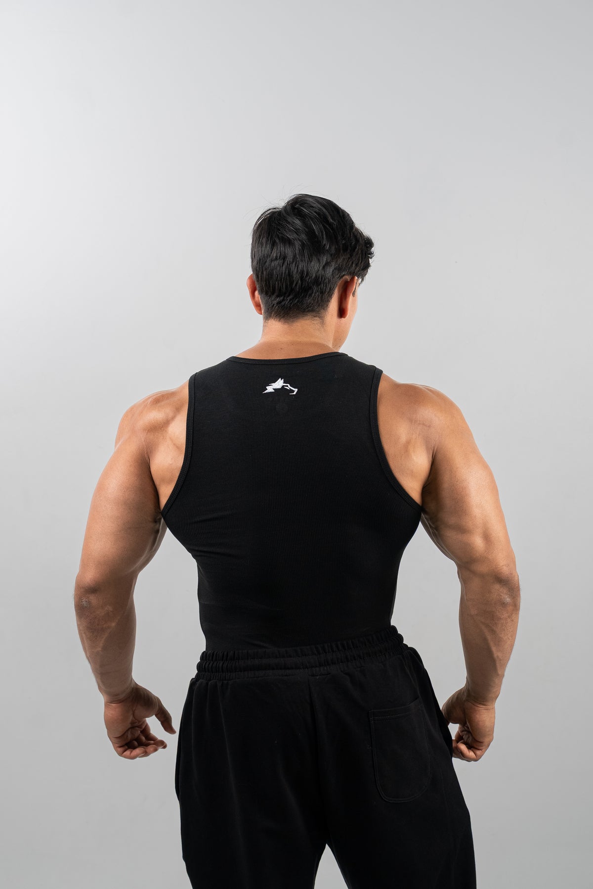 CAMISETA RIB TANK ESSENTIALS - NEGRO