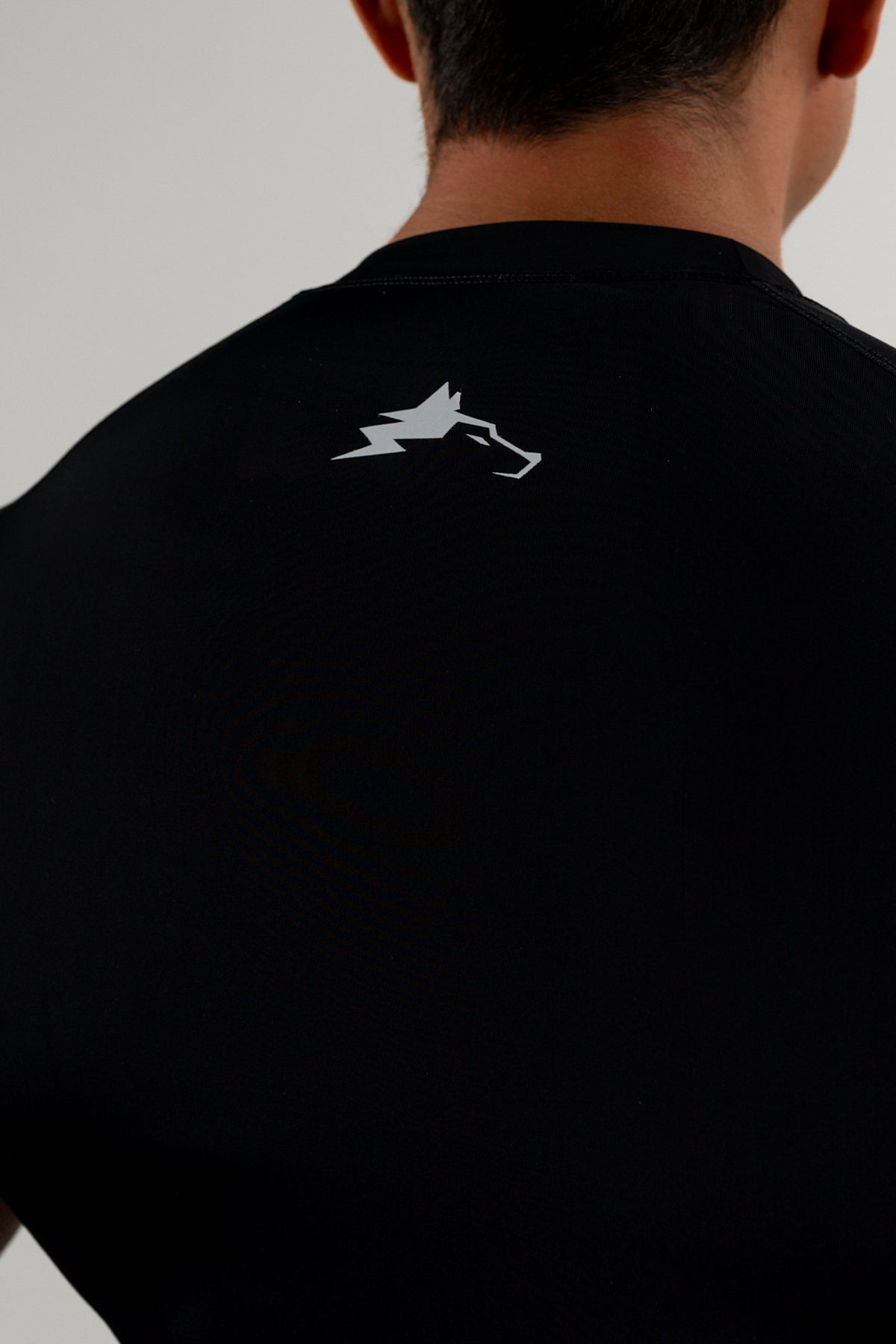 CAMISETA  COMPRESIÓN ALPHA DROP - NEGRO