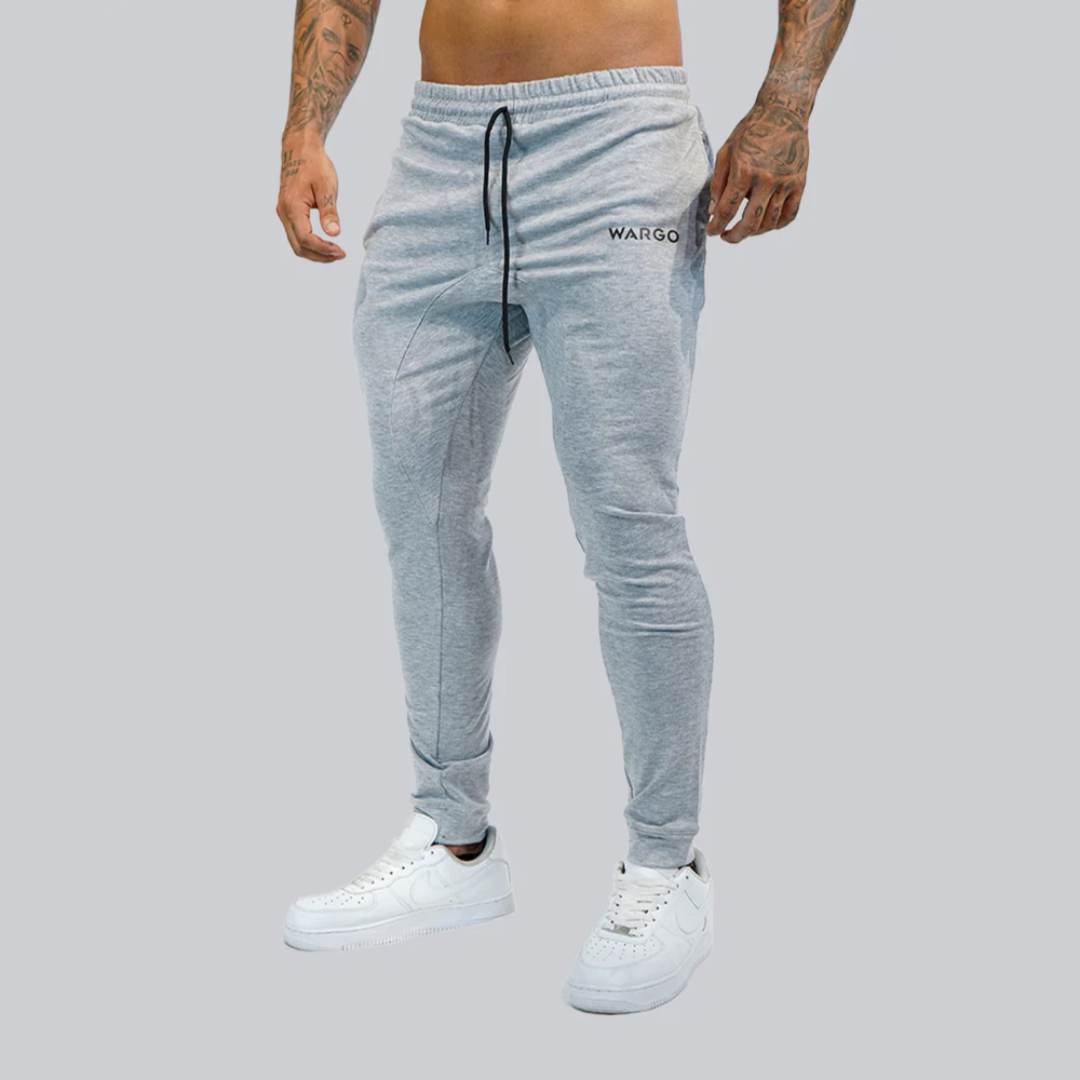 PANTALONES JOGGERS LEGACY HOMBRE - LIGHT GRAY